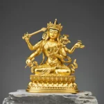 Four-armed Manjusri Bodhisattva with hand-painted face gold copper statue front view