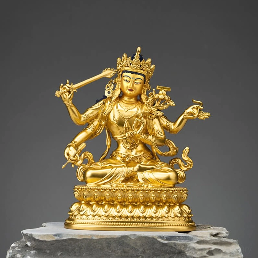 Four-armed Manjusri Bodhisattva with hand-painted face gold copper statue front view