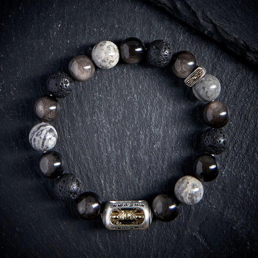 Sacred mantra bracelet with engraved Vajra charm and mixed stone beads top view