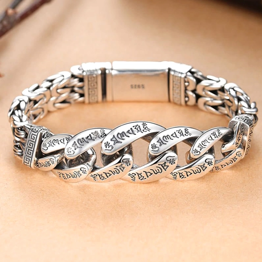 Om Mani Padme Hum engraved chain links showing detailed mantra engravings on copper bracelet