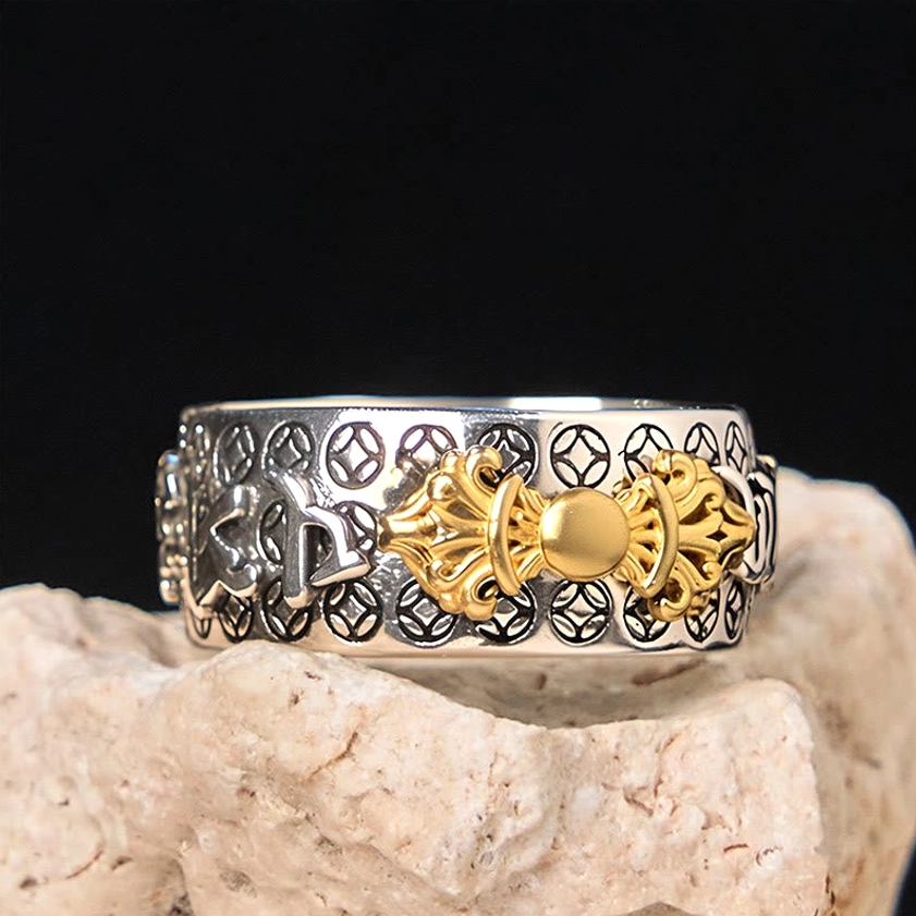 Buddhist mantra ring flat side view displaying relief engraving patterns dual-tone vajra and textured border detail
