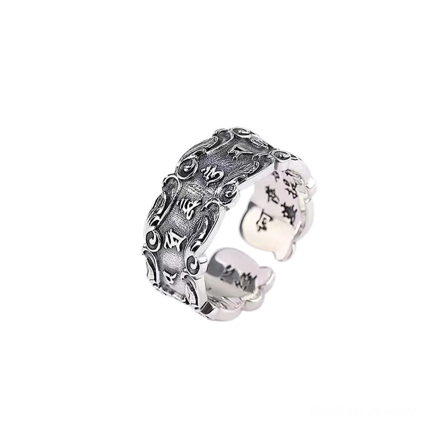 Six-word mantra open adjustable ring side three-quarter view with retro silver texture carved mantras and inner engraved characters on white background
