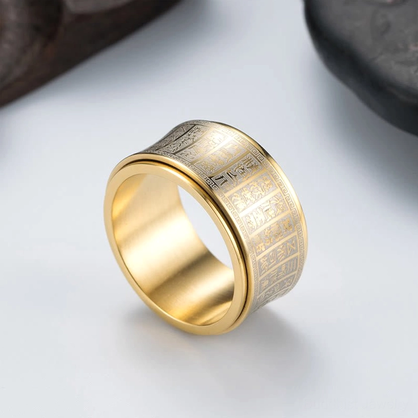 Two-tone titanium steel Buddhist mantra ring with engraved script - side angle view