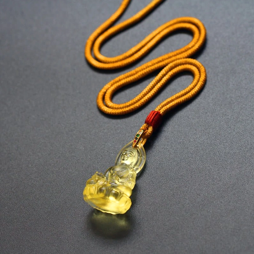 Blue Medicine Buddha Liuli pendant with gold-plated bail and traditional red lanyard knot accent