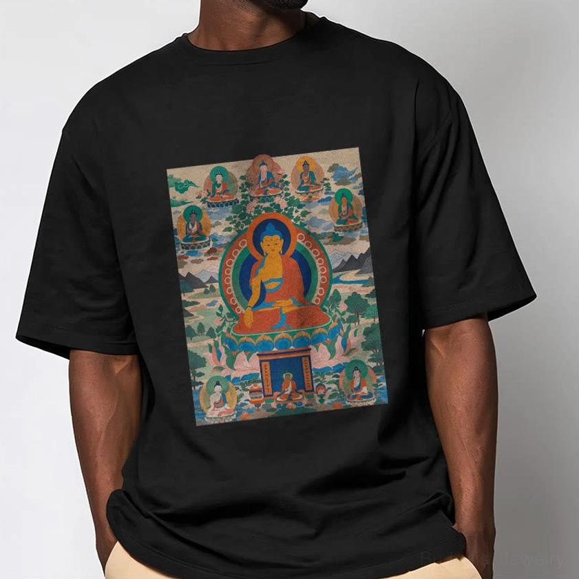Male model wearing black Medicine Buddha spiritual t-shirt with colorful thangka print design