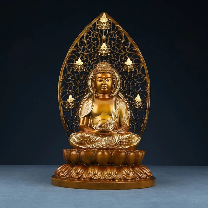 Medicine Buddha meditation statue front view - Dhyana mudra hand position with intricate hollowed backrest on dark background
