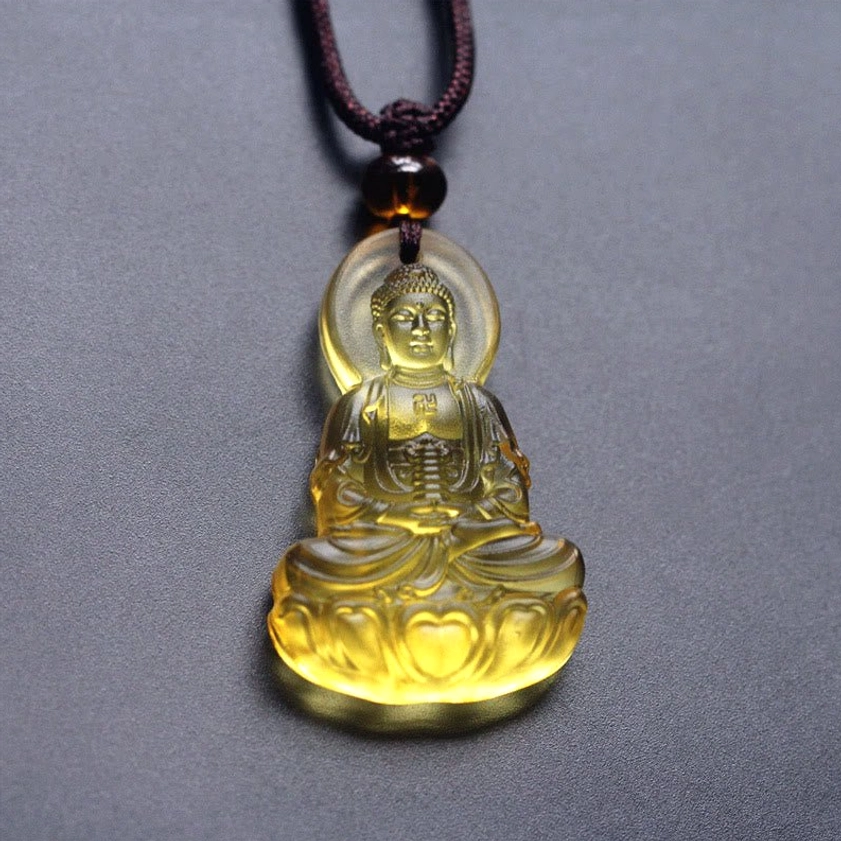 Light yellow translucent Liuli crystal Buddha pendant necklace with seated Buddha figure and halo, two-tone beaded cord, handmade spiritual necklace