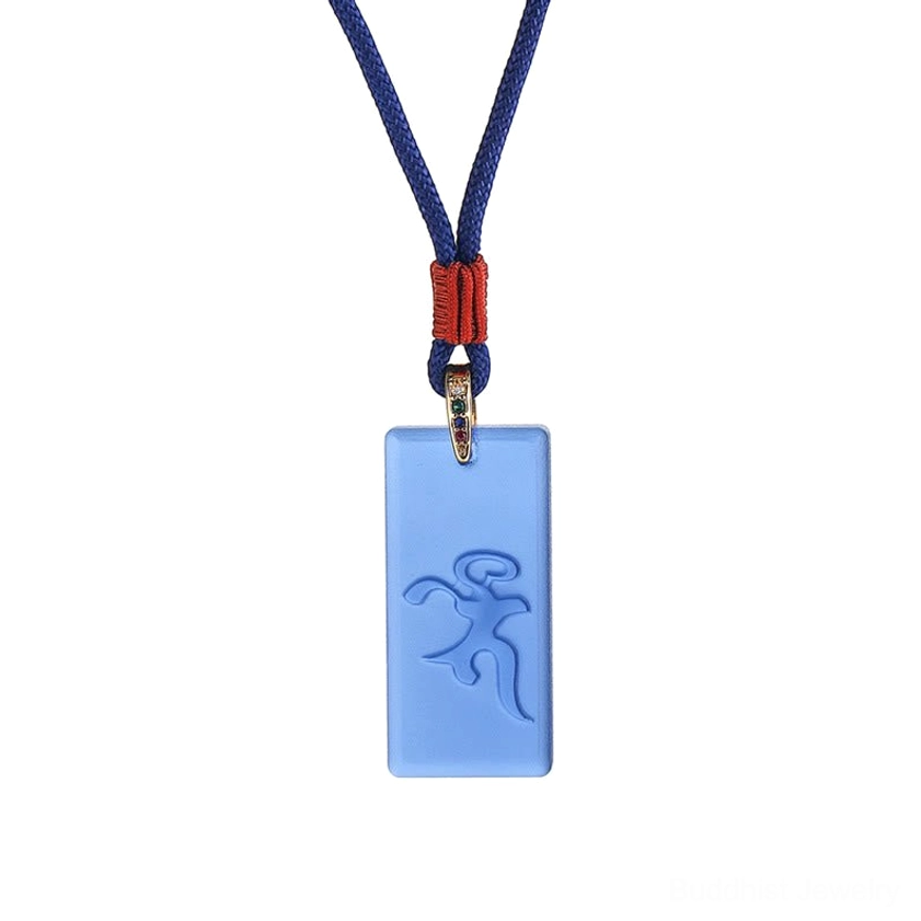 Medicine Buddha Buddhist pendant necklace front view on white background with blue cord