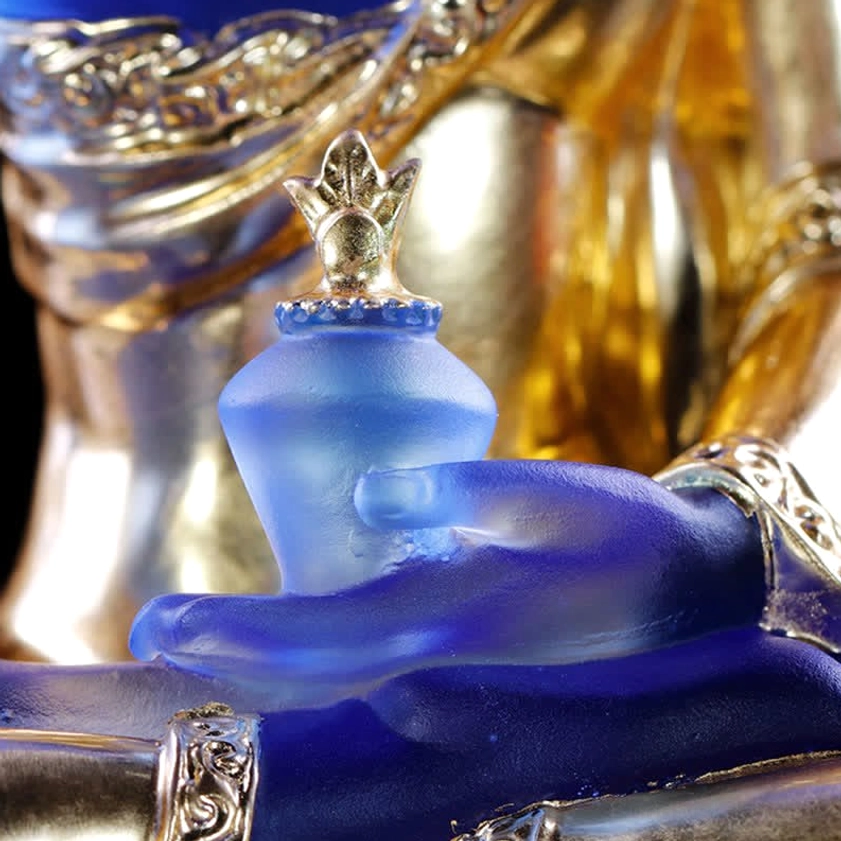 Medicine Buddha glass art piece in office or workspace setting, promoting calm energy, healing presence, professional environment