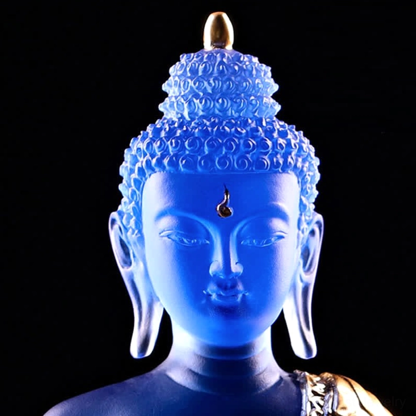 Medicine Buddha Liuli statue right-front angle perspective with studio green plants, deep blue glass, gilded robe lotus pedestal