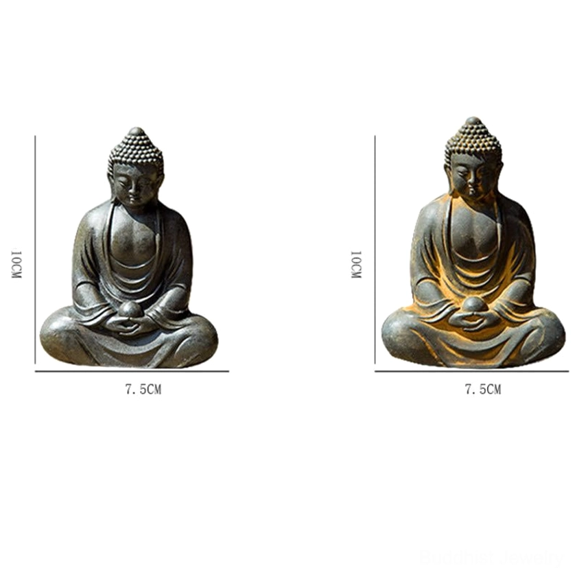 Meditating Buddha statue on decorative wooden surface with floral background styling