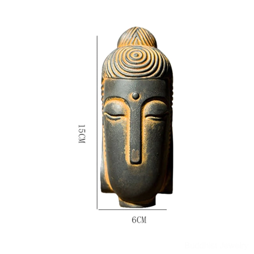 Polished version meditating Buddha statue with smooth finish and closed eyes serene expression