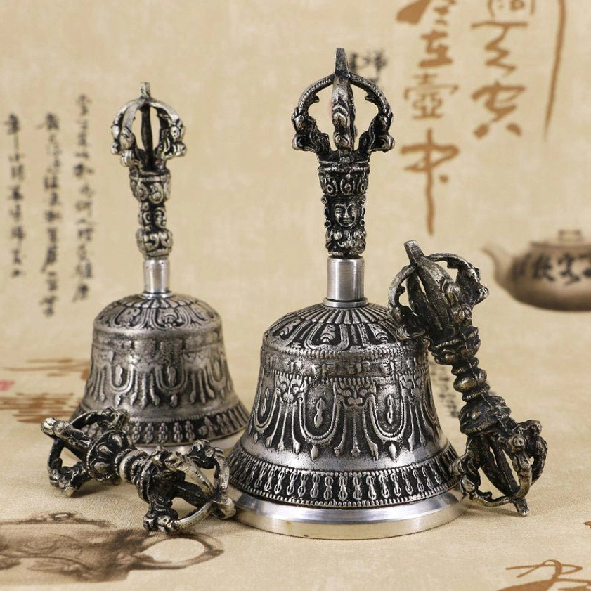 Buddhist meditation bell with vajra showing aged copper patina and authentic artisanal finish
