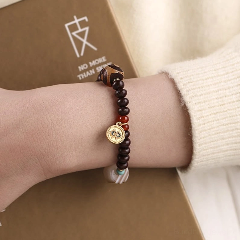 Handmade bodhi seed bracelet with natural agate and dzi bead for spiritual meditation and wellness