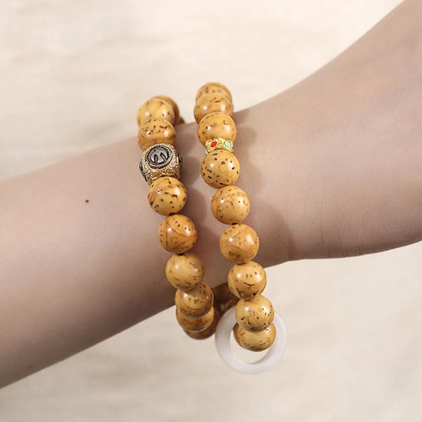 Buddhist double wrap bracelet for meditation and spiritual practice close-up detail view