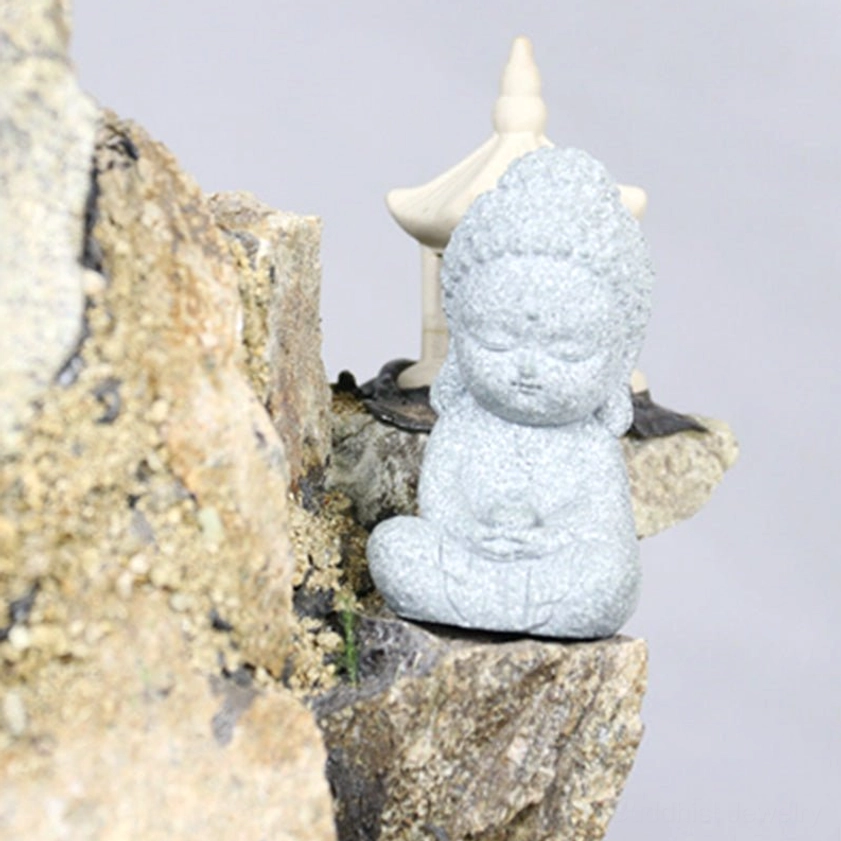 Off-white light-toned meditation Buddha in cross-legged seated pose, natural sandstone finish for authentic spiritual home decor