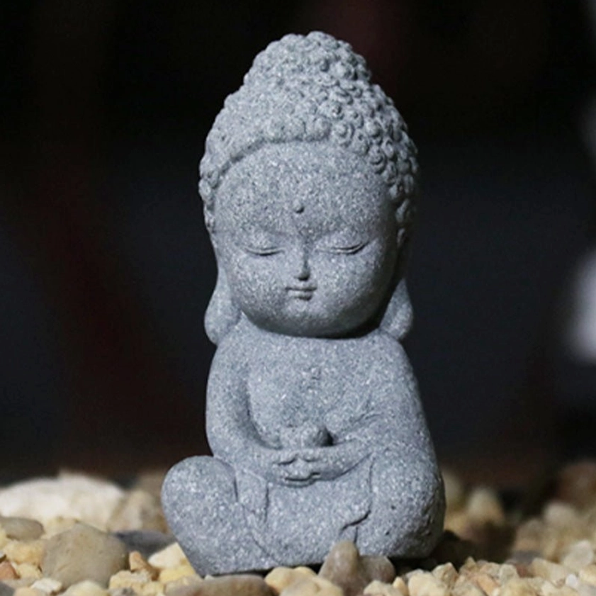 Front view handcrafted sandstone meditation Buddha statue with closed eyes in dark grey matte finish, ideal for mindfulness home decor