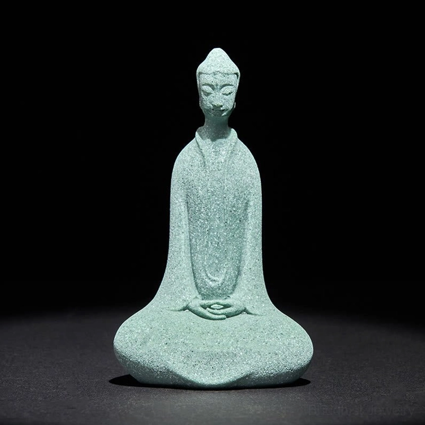 Serene green sandstone meditation Buddha statue in full front view with peaceful closed-eye expression and meditative pose