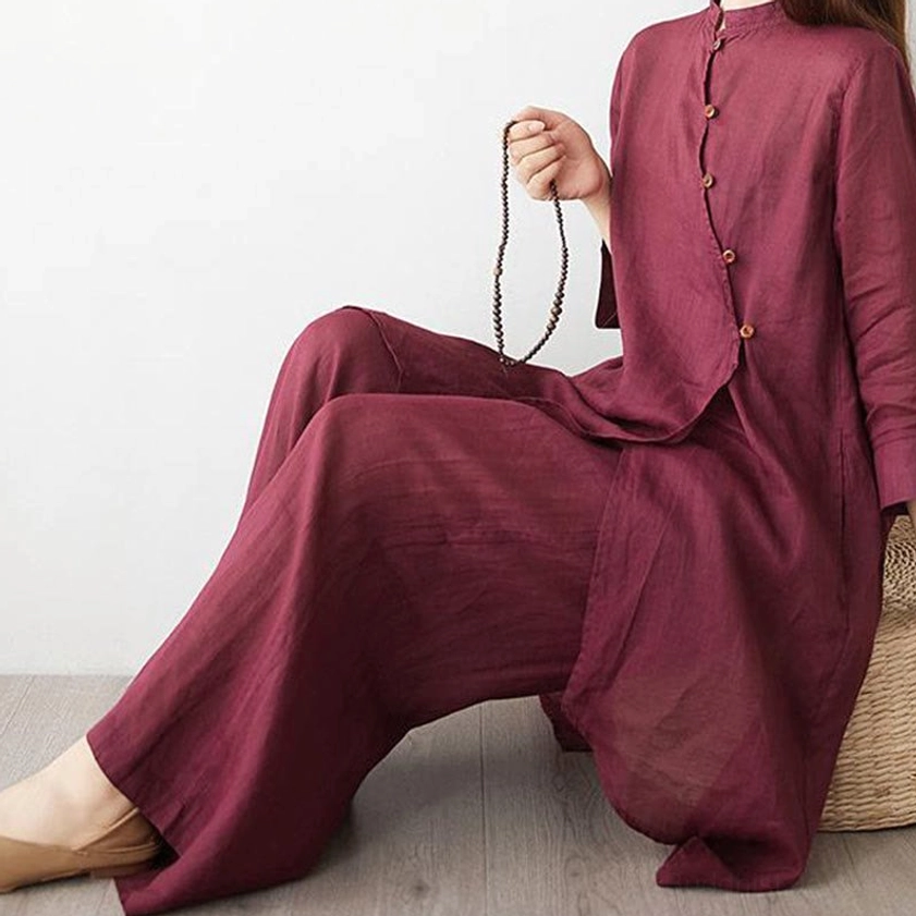 Close-up detail of tai chi clothing set fabric texture and wooden buttons