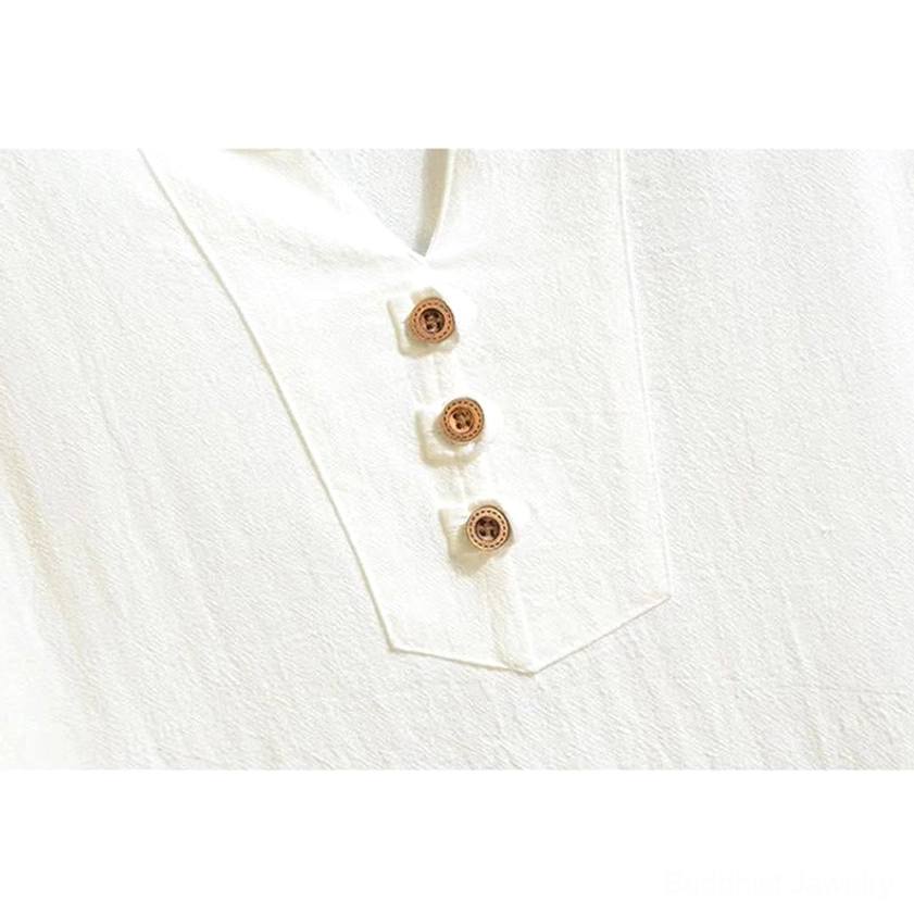 Buddhist meditation henley shirt neckline detail - wooden button henley collar close-up