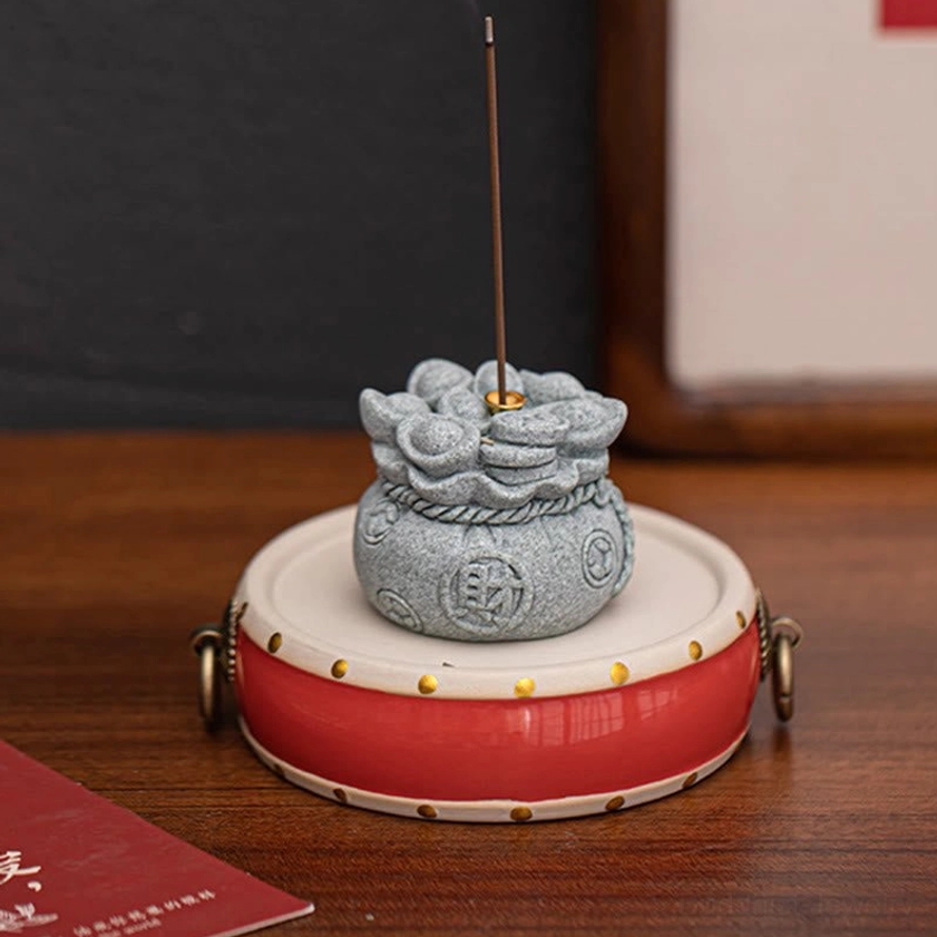 Sandstone incense burner positioned on meditation space showing wellness and mindfulness use