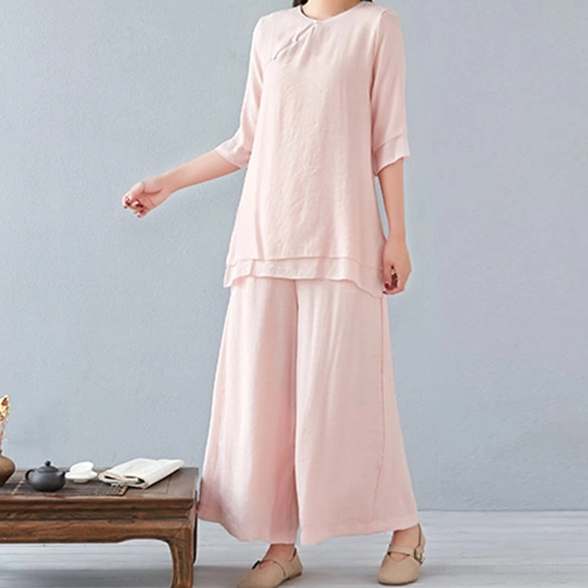 Close-up of meditation linen pants pocket detail and elastic waistband design showing functional features