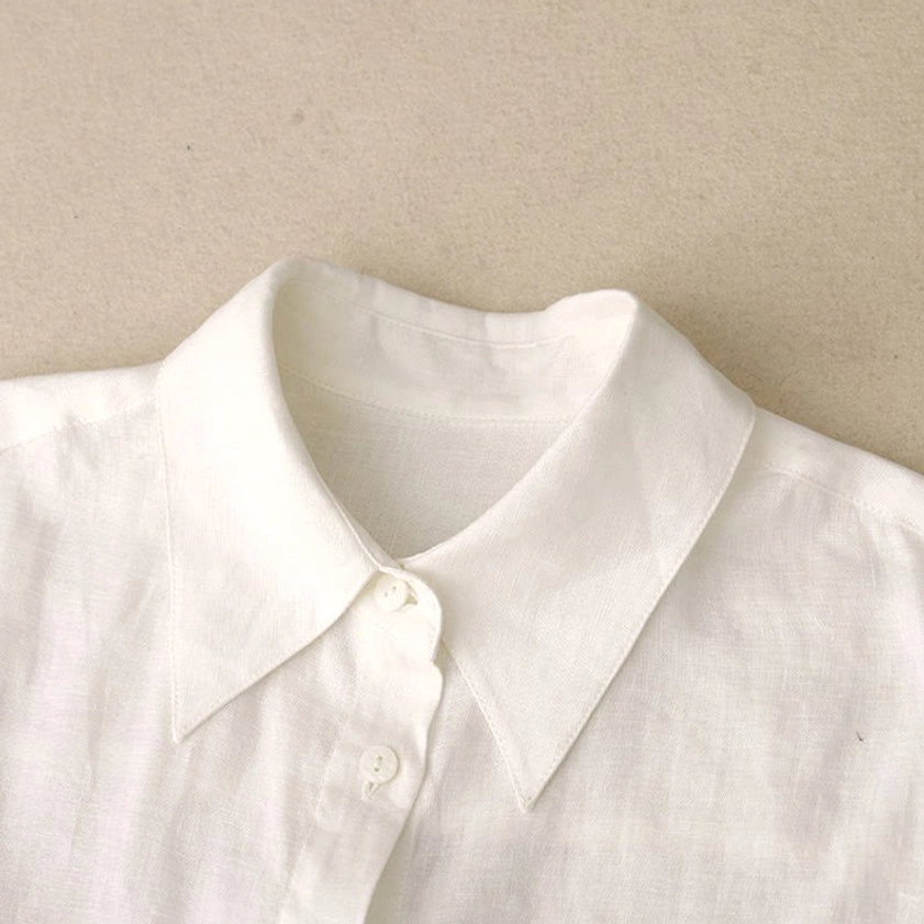 Women's meditation lounge set back view showing shirt hem curve and shorts waistband elastic construction