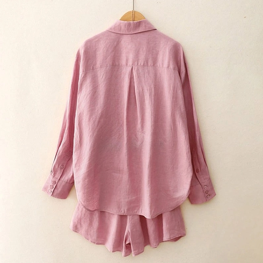 Back view of meditation loungewear set showing rear pleat detail on long-sleeve shirt and cuff buttons