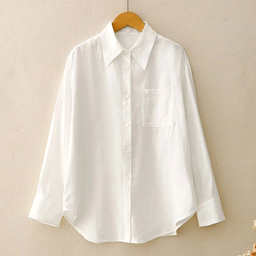 Meditation lounge set detail of shirt front showing button closure, pocket functionality, and lapel design