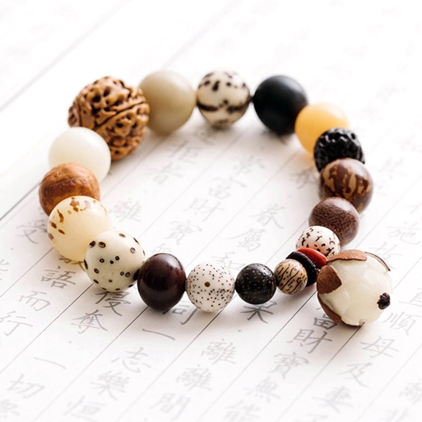 Meditation mala bracelet with bodhi seeds and lotus charm for spiritual practice