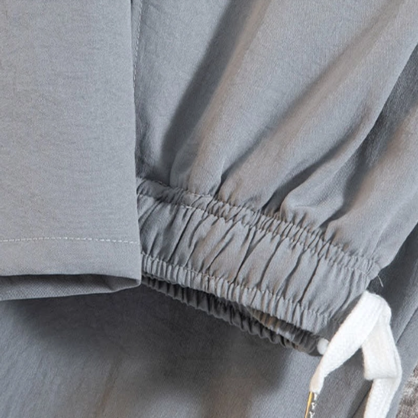Elastic waist and drawstring closure detail on Buddhist meditation shorts, featuring practical pocket design for spiritual practice wear