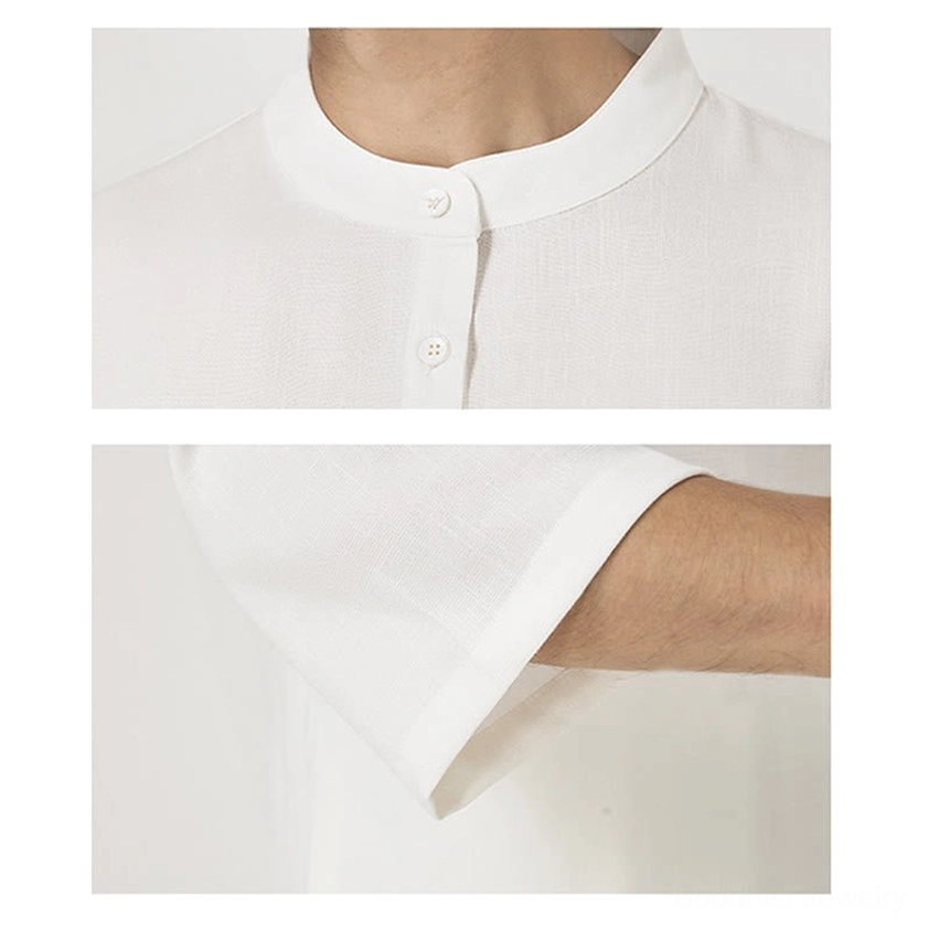 Close-up detail of meditation clothing stand collar with button closure and three-quarter sleeve cuff, linen fabric texture