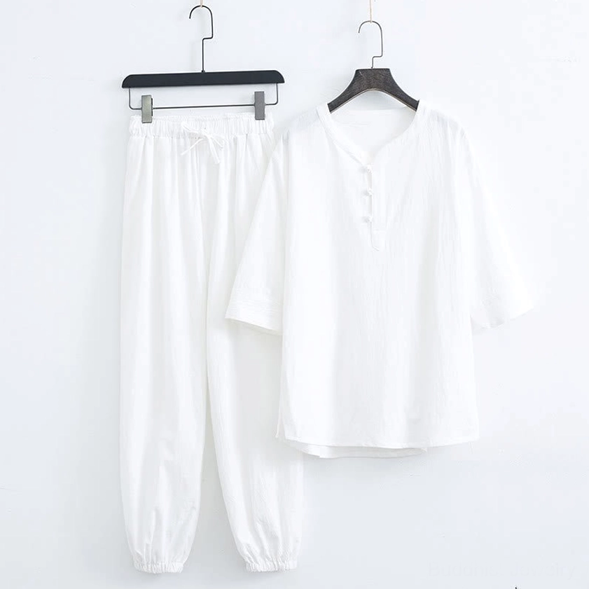 Men's meditation wear set in pure white with relaxed three-quarter sleeves and elastic cuff pants
