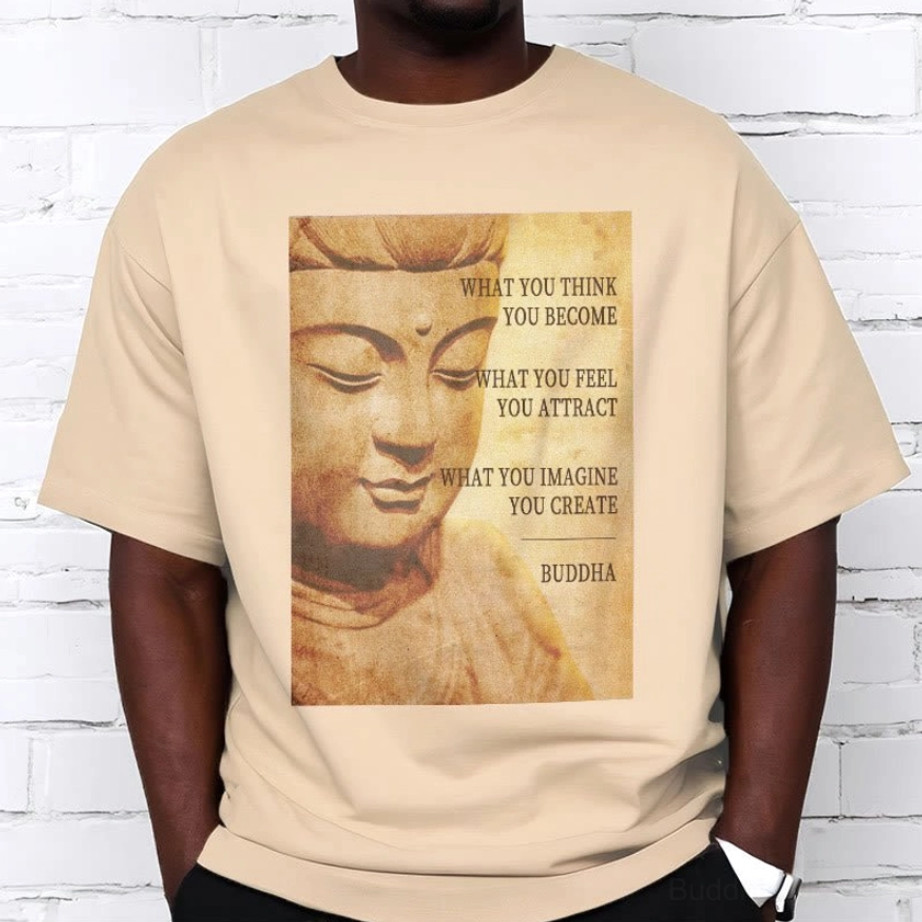 Men wearing beige casual Buddhist t-shirt white brick wall backdrop, relaxed fit with sepia Buddha artwork