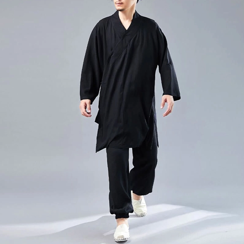 Front standing pose of man in black cotton-linen Buddhist meditation uniform