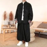 Men's black dragon Tang suit two-piece set with traditional frog buttons and stand collar, front full-body view