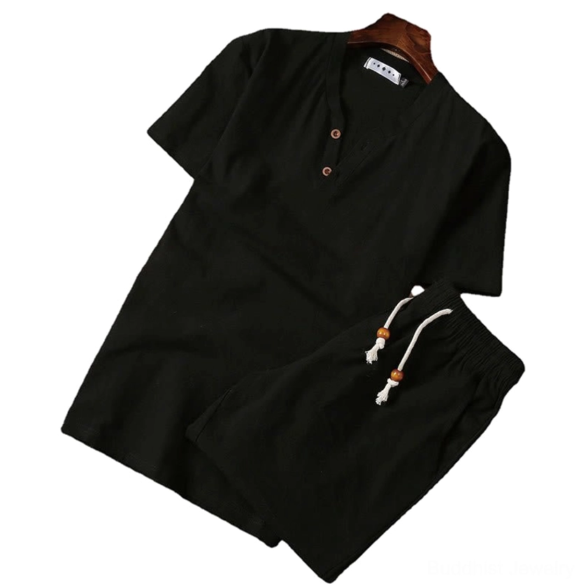 Men's black henley meditation suit set with drawstring shorts on neutral background