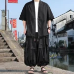 Men's black meditation kimono two-piece set with frog button jacket and drawstring wide-leg pants, front full-body view