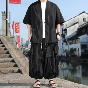 Men's black meditation kimono two-piece set with frog button jacket and drawstring wide-leg pants, front full-body view