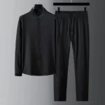 Men's black Buddhist meditation linen shirt and drawstring pants set, front view hanging display