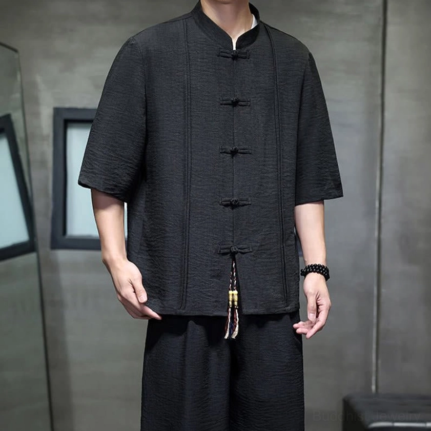 Full-body view of men's black meditation suit for Buddhist practice and spiritual wear