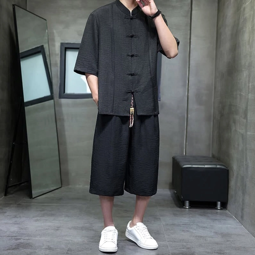Men's black meditation suit with traditional Tang style and contemporary comfort features