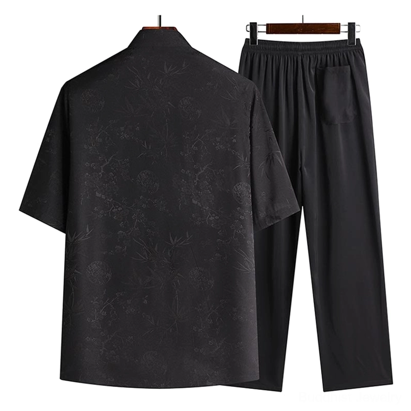 Back view of men's black tang suit showing stand collar and straight cut pants with side pockets