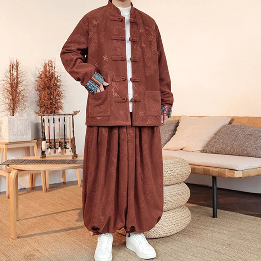 Chocolate Tang suit for men with visible ethnic embroidered cuff patterns and traditional design elements