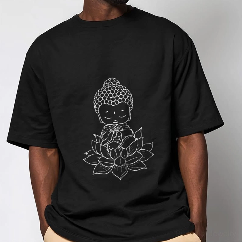 Male model wearing black Buddha lotus meditation tee with khaki pants studio background