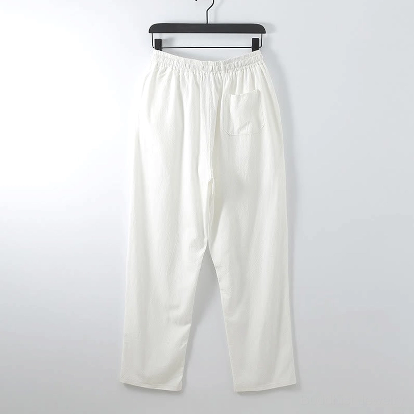 Men's white Buddhist meditation pants front view - functional side pocket and elastic drawstring waist