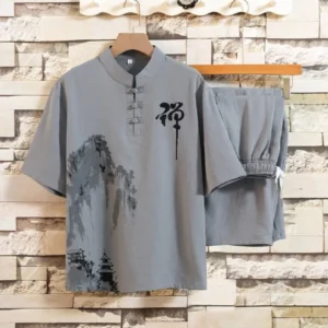 Men's Buddhist meditation linen shirt and shorts set with mandarin collar, frog buttons, and ink-wash landscape print in light gray - front view hanging display