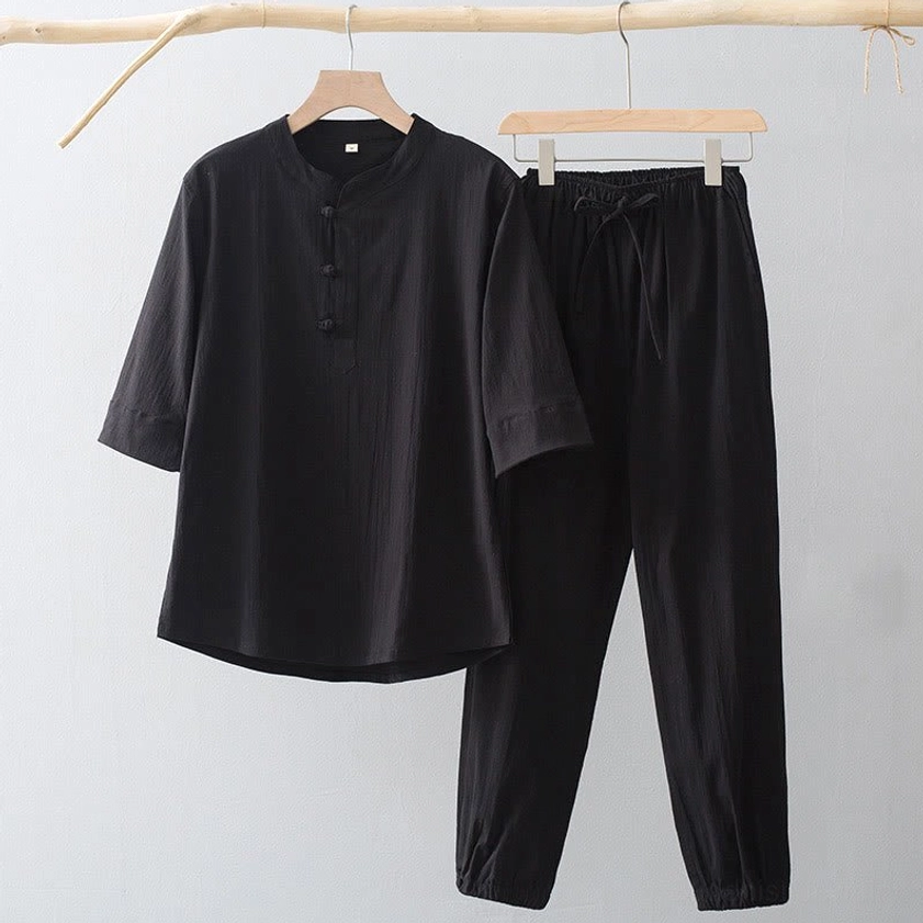 Black men's Buddhist meditation clothing set with three-quarter sleeve shirt, frog button closure, drawstring jogger pants, spiritual practice wear