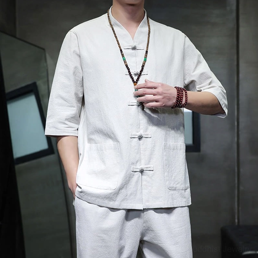 Men's Buddhist meditation cotton linen tang suit set detail shot of traditional frog button fastening system