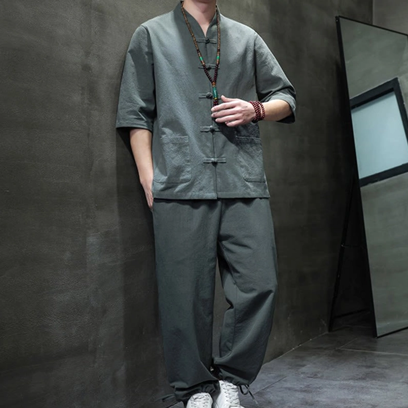Men's Buddhist meditation cotton linen tang suit set three-quarter front view with frog button close-up details